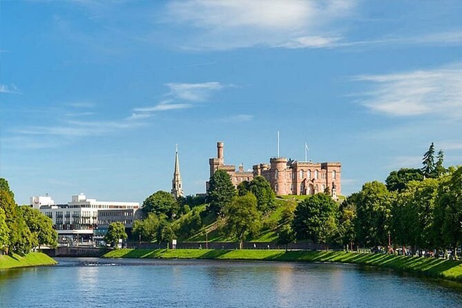 Inverness Castle on its bank above the River Ness, with the city spires beside it