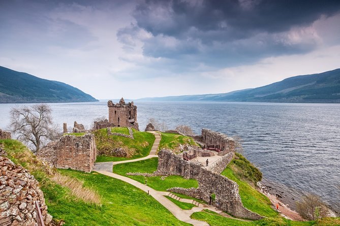Urquhart Castle from the landward side under a heavy sky, Loch Ness beyond